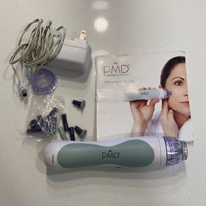 PMD Microdermabrasion device with replacement pads